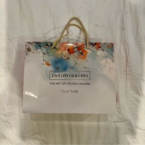 intimissimi White Paper Tote with Blue and Orange Floral Accents